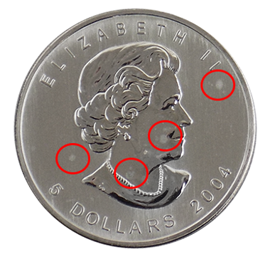 What Are Milk Spots & How Do They Affect The Value Of Silver Coins?