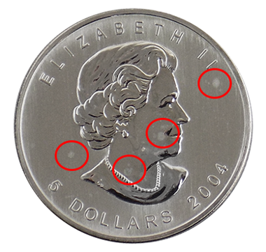 What Are Milk Spots How Do They Affect The Value Of Silver Coins