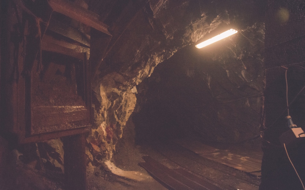 Underground tunnel inside a mine with lights inside
